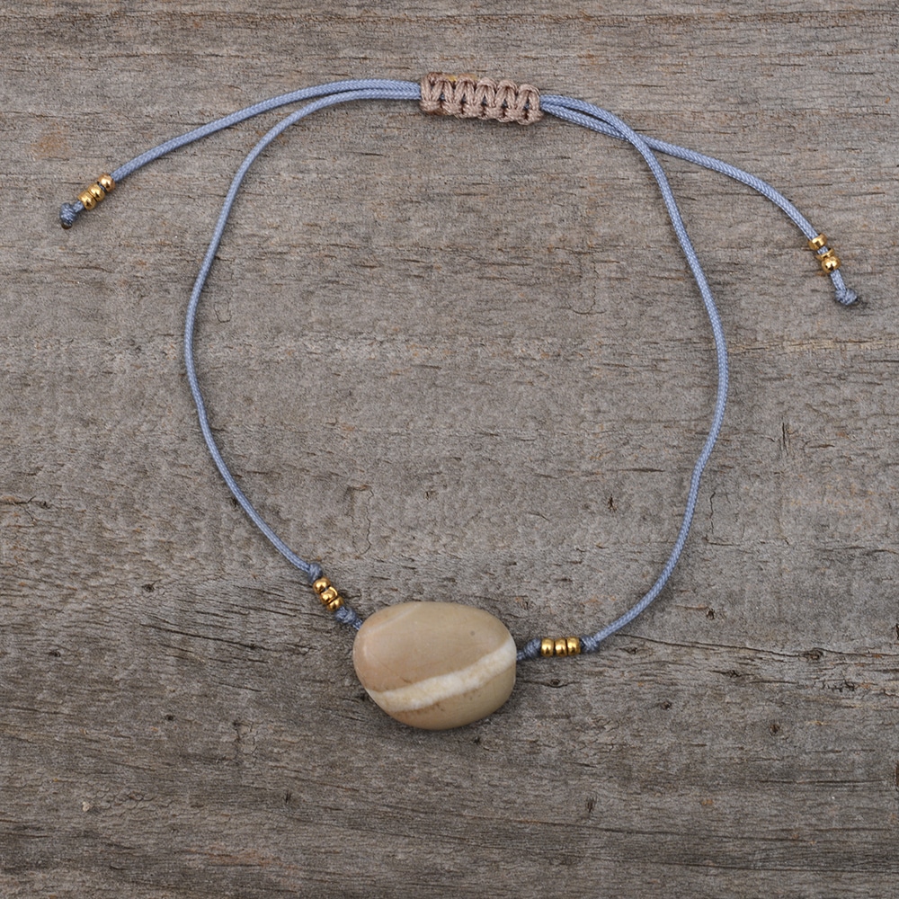Beige pebble bracelet with white stripe